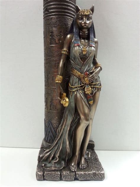 egyptian statue goddess bast bastet cat leaning on candle pillar wu76698a4 beautiful