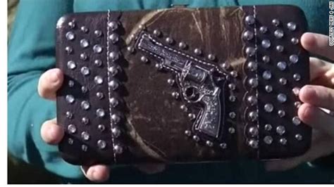 gun themed purse delays teen flier cnn