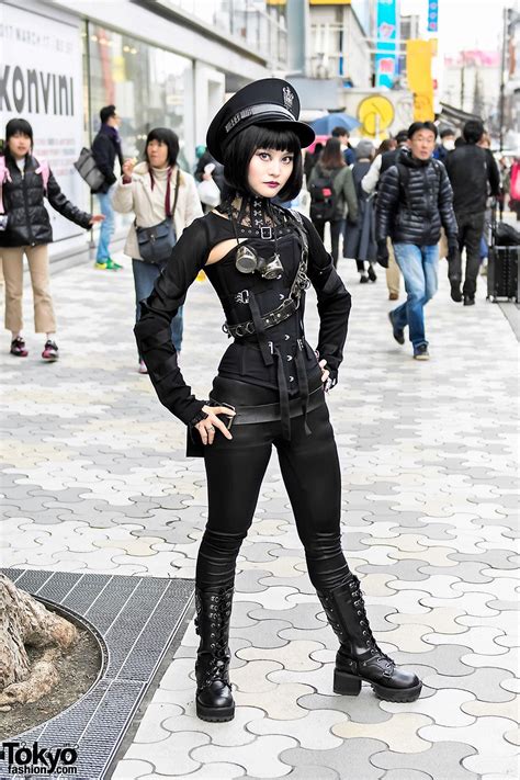 alice s dark gothic steampunk look includes a black cutout top from ozz