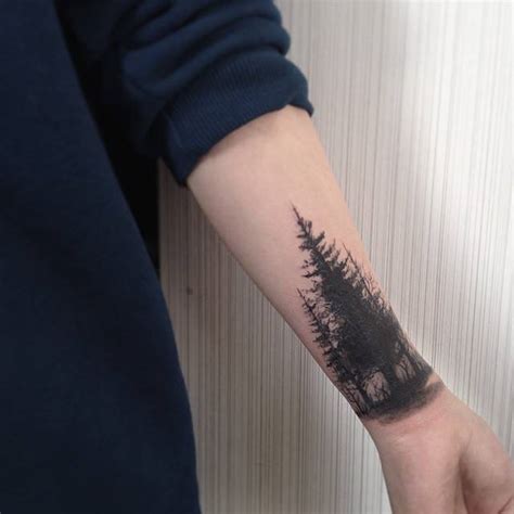 blackwork style forest tattoo   forearm