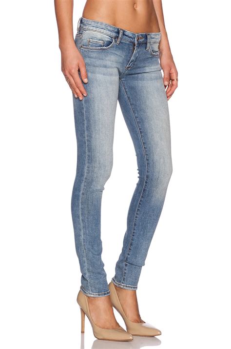 blank skinny low rise stretch denim jeans in blue lyst