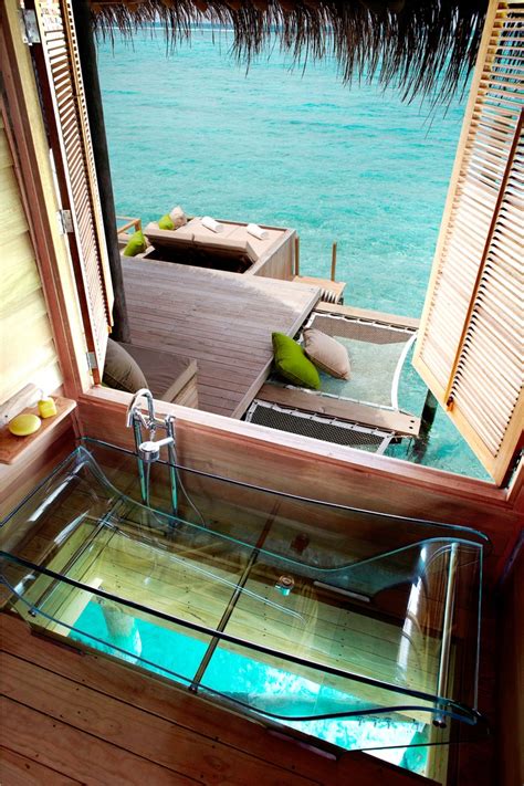 glass bottom bathtub six senses laamu maldives luxuriate