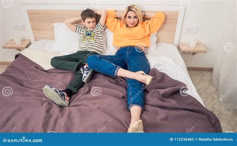 mother with son on bed stock image image of love happy 112236483