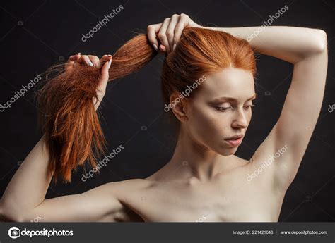 Slim Young Sex Appealing Girl With Long Gorgeous Red Hair On Bla