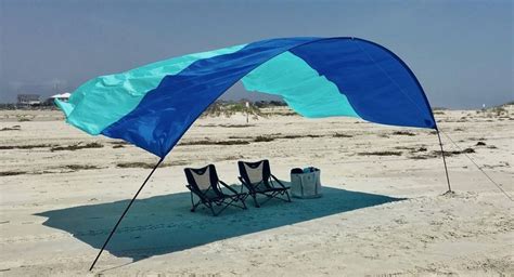 shibumi shade   arch shaped beach canopy   supported   ocean breeze