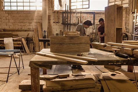 manual workers making furniture  carpentry workshop stock photo