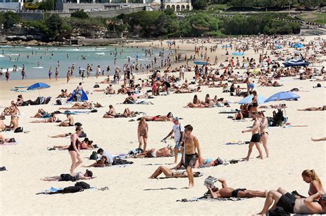 huge crowds flocked to sydney s iconic bondi beach despite the