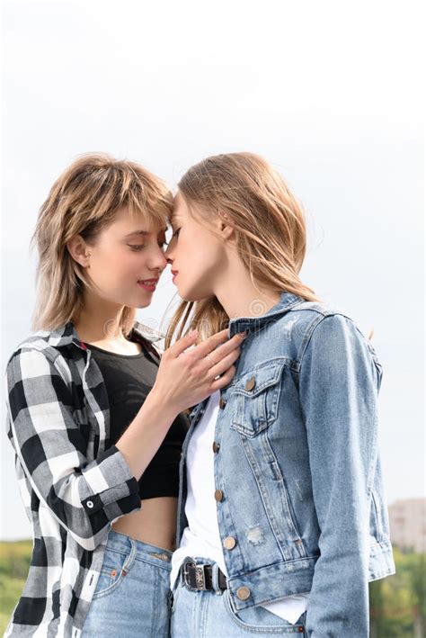 Lesbian Couple Kissing With Eyes Closed Outdoors Stock Image Image Of