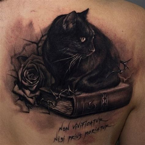 black cat sitting   book tattoo tattooimagesbiz