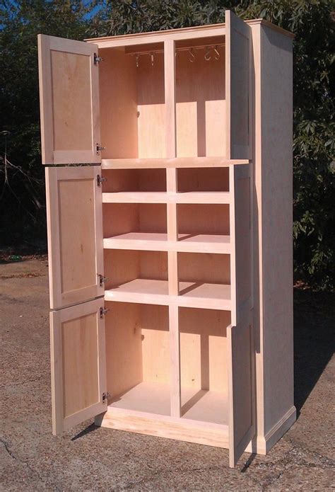 hand  freestanding pantry cabinet  ambassador woodcrafts