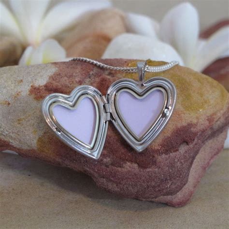 silver heart locket shown open heart locket photo locket silver heart