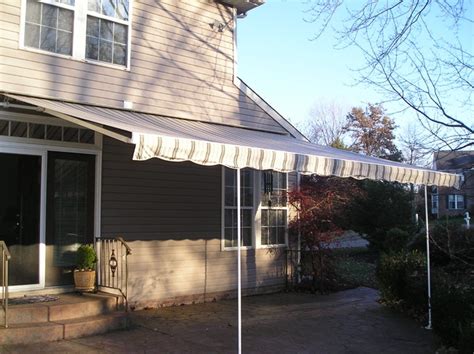 retractable awning  removable legs traditional patio   thomas  giel garage