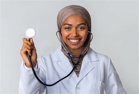 Portraif Of Black Muslim Female Doctor In Hijab With Stethoscope Stock