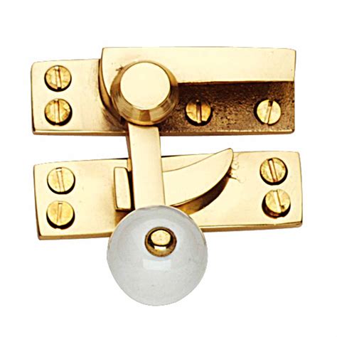 traditional window sash lock solid brass porcelain knob