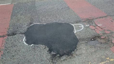 manchester man draws penises around potholes so the city will fix them the verge