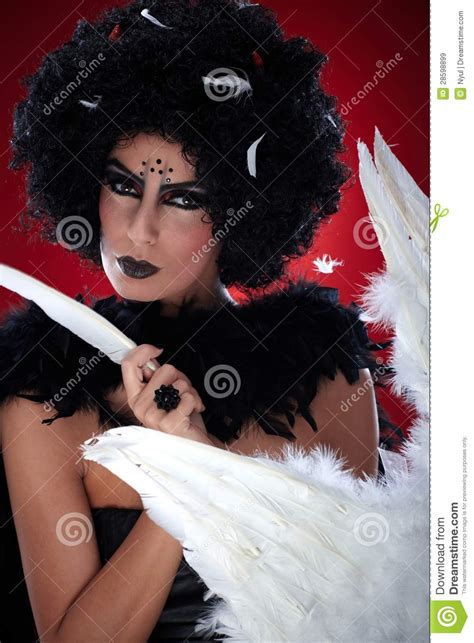 Wicked Woman Pulling Angel Feathers Stock Image Image Of Bogy Face