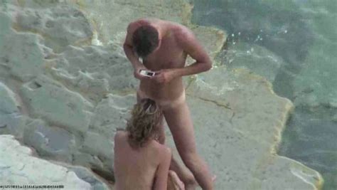 nude couple caught fucking missionary style on the rocky beach video
