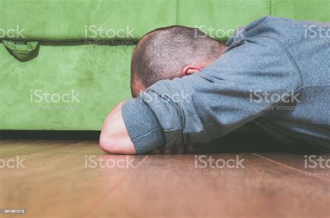 Depression Sadness Loneliness Depressed And Lonely Man Lying Face Down