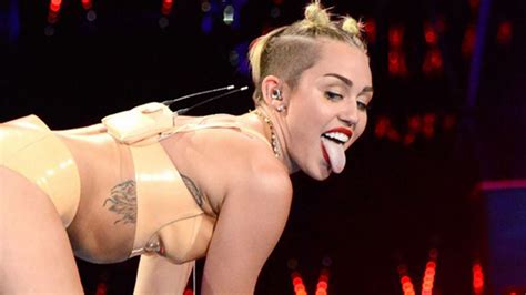 miley cyrus 15 biggest scandals — from showing off her bra to raunchy vmas oh miley
