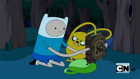 Image S4e7 Finn And Jake Holding The Enchiridion Png
