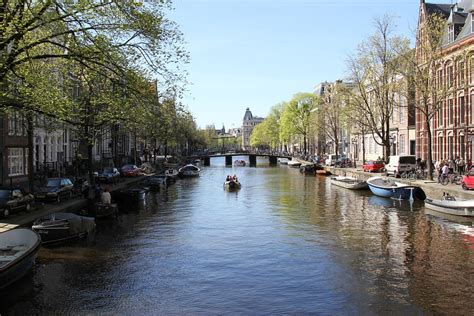 amsterdam canal europe netherlands dutch holland      laminated poster  bright