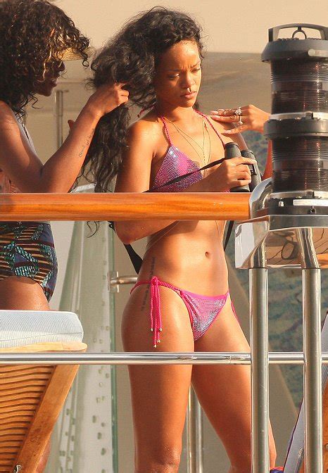 Rihanna Flaunts Sculpted Physique In Hot Pink Bikini Aboard Luxury