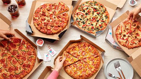 dominos pizza inauguro su tienda numero  en el pais  espera abrir  mas este ano forbes