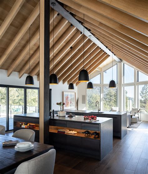 large wood beam ceilings    story wing modern cabin modern home  boulder colorado