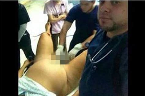 Outrage After Doctor Takes Selfie Next To A Woman Giving