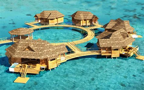 The Caribbean S First Over Water Bungalows Latitudes Travel