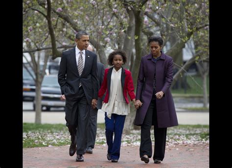 obamas stroll to church service amidst cherry trees in d c photos