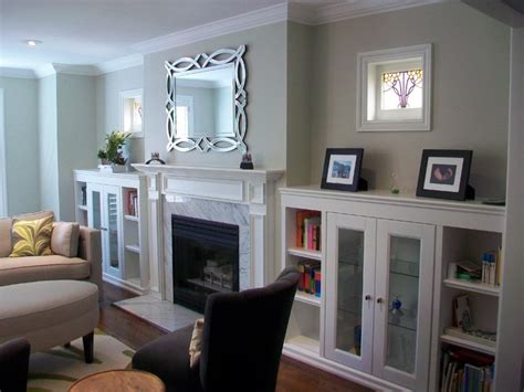 built  cabinets flanking fireplace
