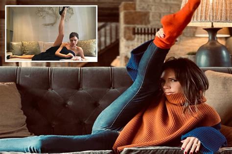 victoria beckham kicks her leg in the air for her signature pose as she