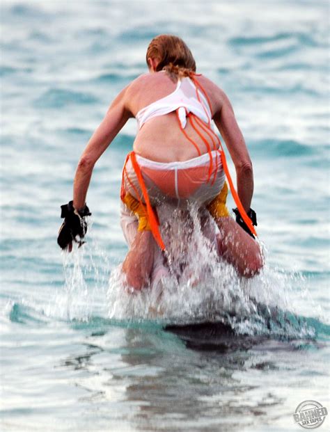 nicollette sheridan caught training in wet bikini on a