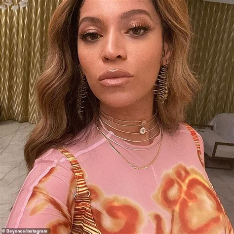 beyonce looks chic as she flaunts her enviable curves in a pink