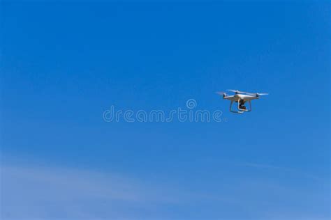drone  camera flying  blue sky stock photo image  motion blue