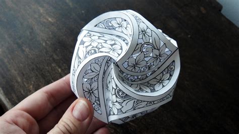 hattifant triskele paper globes  papercut