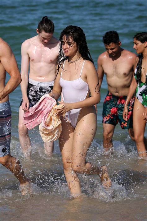 Camila Cabello Wears A White Swimsuit During A Pda Filled Beach Day
