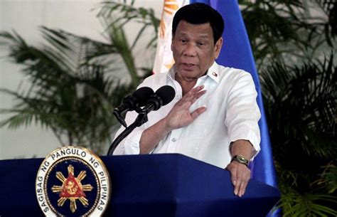 philippine president threatens revolution if critics push