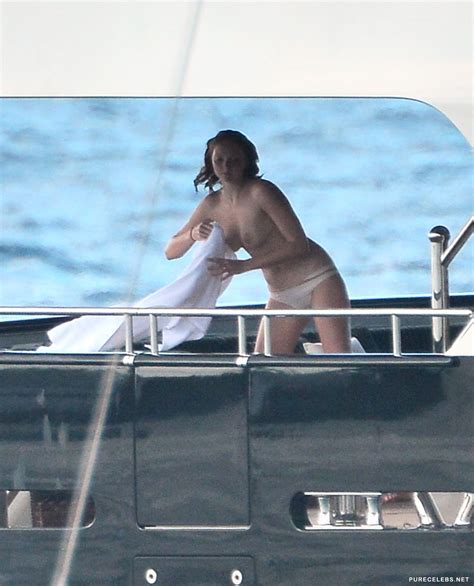 lily cole caught topless on a yacht