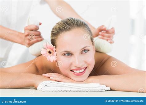 Beautiful Blonde Enjoying A Herbal Compress Massage Stock Image Image