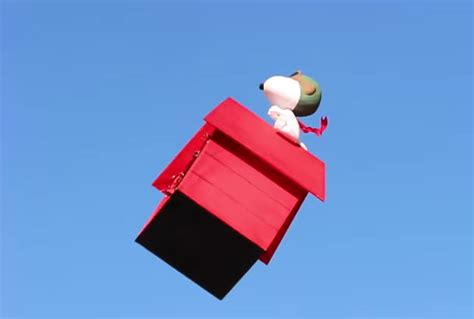 modified  drone      snoopy flying   top   doghouse