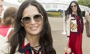 demi moore dresses the part in a rose print jacket at the chelsea