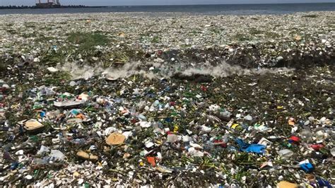 dominican republic garbage waves on beach kokh
