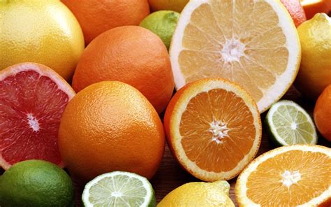 colorful cut   halves sour fruits belonging   citrus family oglmn