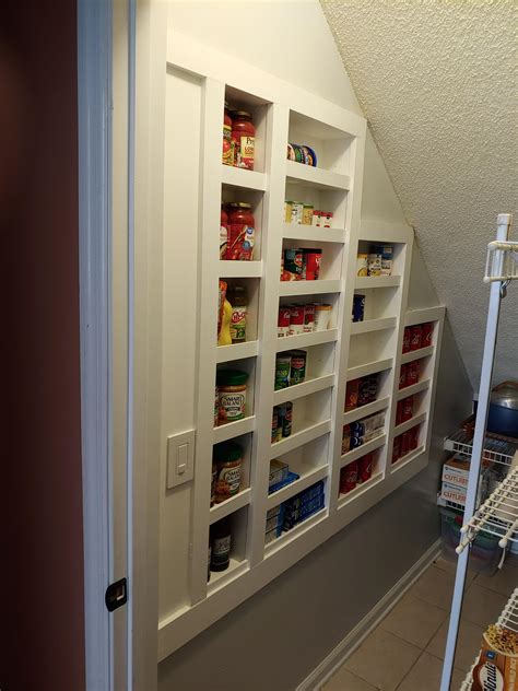 built recessed shelves   wall studs   unusable pantry