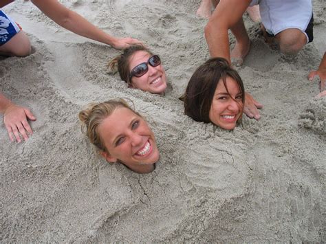 three 3 happy buried in the sand girls happygirls