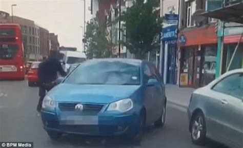 terrifying moment cyclist armed with a huge zombie knife