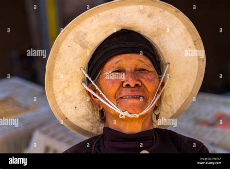 Chinese Farmer Woman Wearing Straw Hat At The Market In Rural Hot Sex