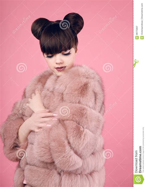 beauty makeup fashion teen girl model in fur coat